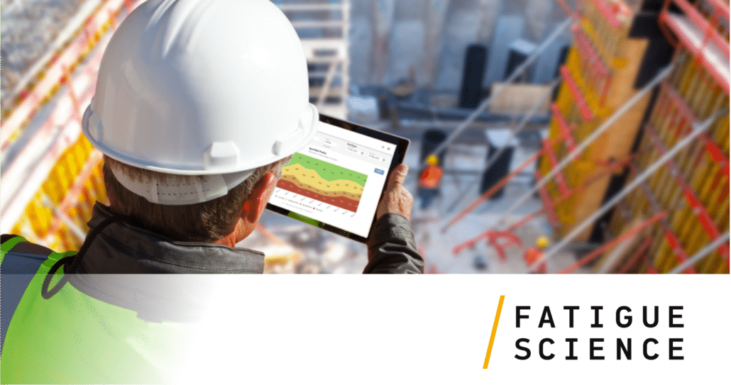 Industrial worker looking at the Readi platform on his tablet.