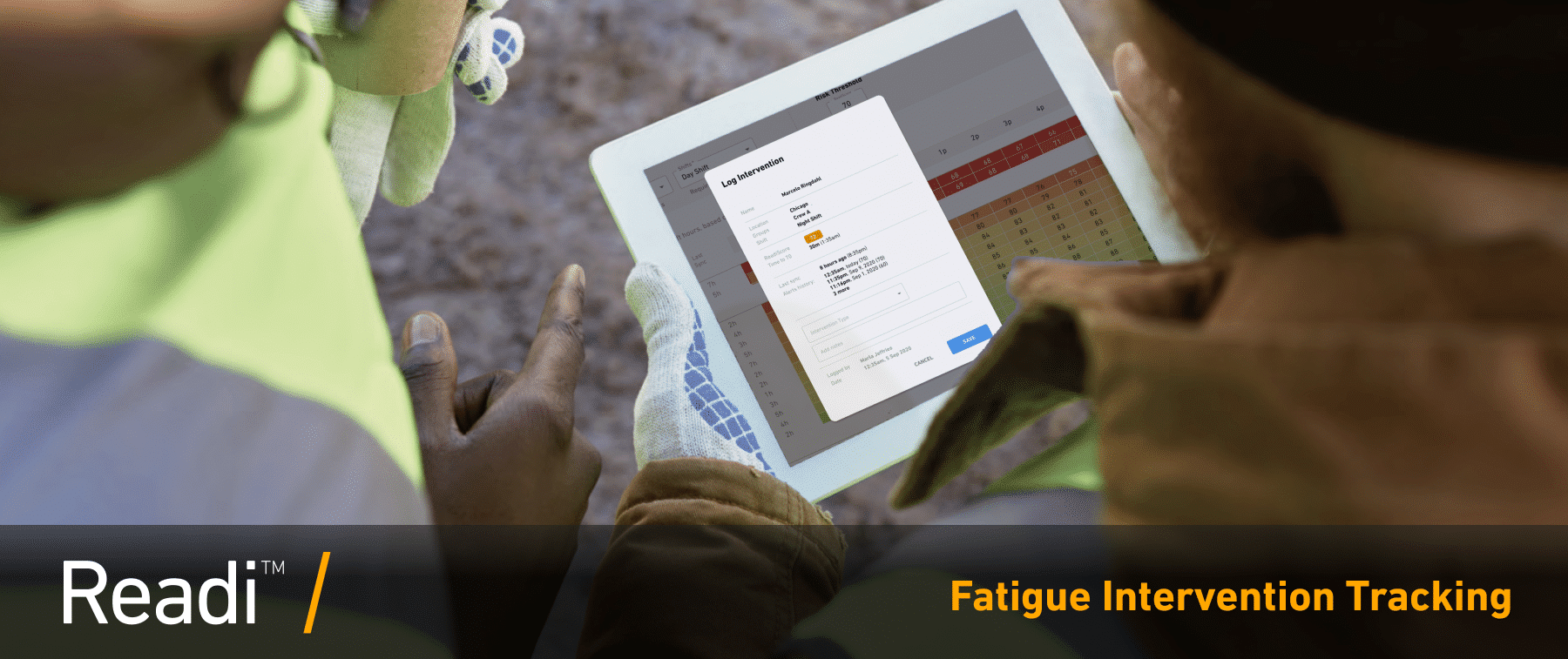 Industrial Workers holding an IPad