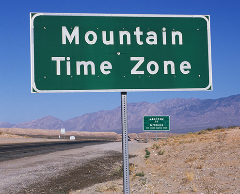 FS Blog - sign Indicating Mountain Time Zone