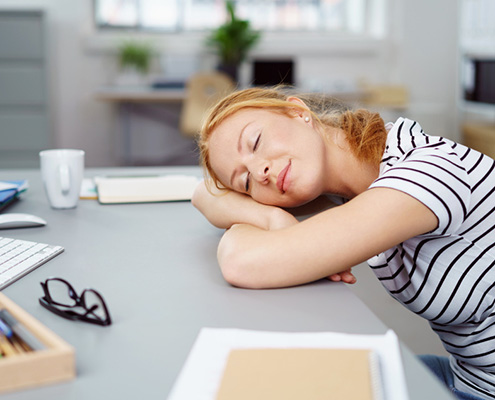 FS Blog - young woman sleeping at work